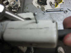 With cable push in slide cotter pin in on left side hole