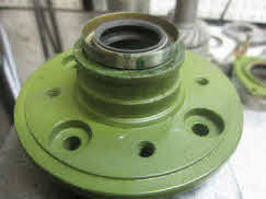 Install second oil seal with spring area up